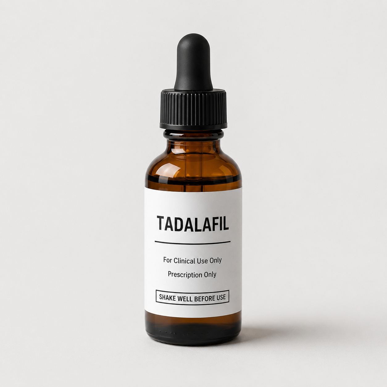 Amber glass tadalafil dropper bottle with a minimalist white clinical label for physician-guided sexual wellness programs.